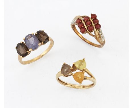 THREE 9 CARAT GOLD GEM-SET RINGS,&nbsp;including&nbsp;A GARNET AND DIAMOND RING; A SMOKY QUARTZ AND CITRINE RING; and AN AMET