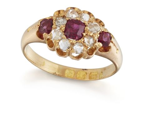 A VICTORIAN 18 CARAT GOLD RUBY AND DIAMOND CLUSTER RING, a cushion-cut ruby within a border of rose-cut diamonds in high claw