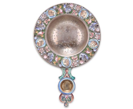 A RUSSIAN SILVER AND ENAMEL TEA STRAINER, Second Kokoshnik, Moscow, 1908-1926, picked out with polychrome enamels in a floral