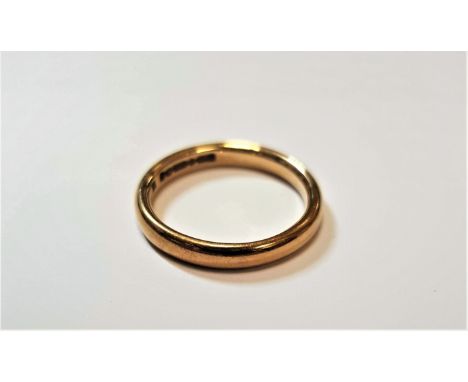 A 9 CARAT GOLD BAND RING.&nbsp;Hallmarked Birmingham 1947, ring size L, 2.8 grams