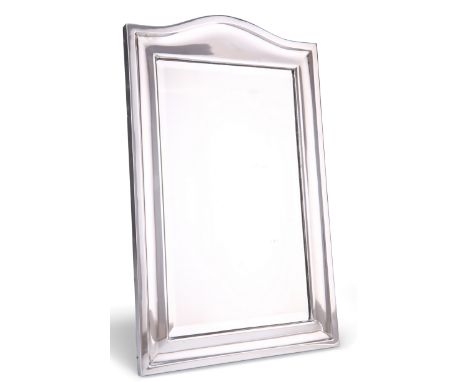 AN EDWARDIAN SILVER EASEL MIRROR,&nbsp;by Henry Matthews, Birmingham 1908, rectangular with arch-top and bevelled glass plate