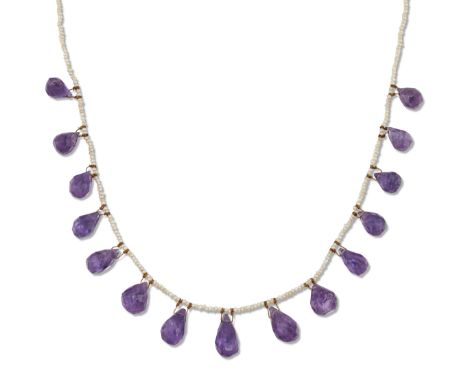 AN AMETHYST AND SEED PEARL FRINGE NECKLACE, graduated briolette-cut amethysts to a seed pearl chain. Marked '9CT', 40cm long&