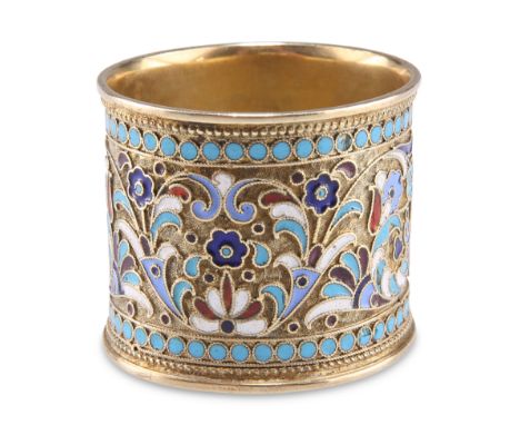 A RUSSIAN SILVER AND CHAMPLEVÉ&nbsp;ENAMEL NAPKIN RING, master AH, Kokoshnik mark, c.1905, picked out with blue, red, white a