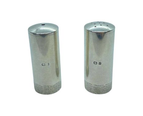 Stuart Devlin Pair of Miniature Salt and Pepper Pots. Stuart Devlin, London 1968Height 4.2 cmsCondition report: Excellent