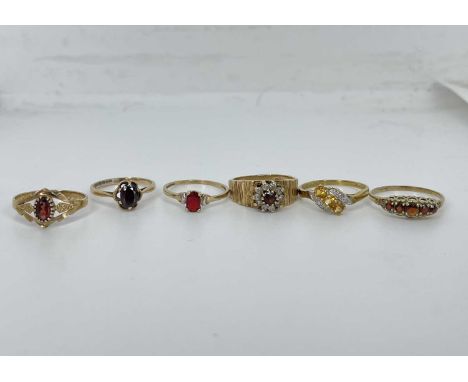 Quantity Of 9ct Gold Rings, To Include a Diamond And Citrine Ring etc ( 10.8 grams ) 4x gold garnet ring and Citrine And diam