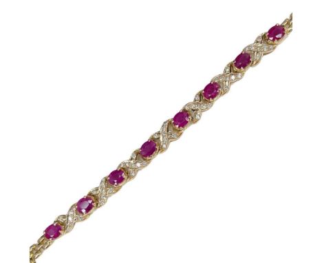 18ct Gold Ruby And Diamond Bracelet oval shaped ruby and diamond bracelet all in 18ct yellow goldCondition report: excellent 