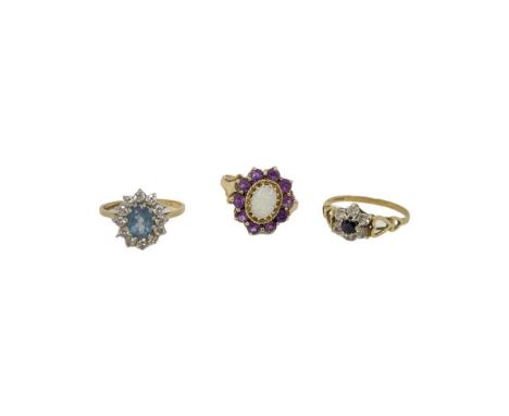 Mixed Lot Of 9ct Gold Rings opal and amethyst cluster ringBlue topaz and cubiz zirconia cluster ringsapphire and cubiz zircon