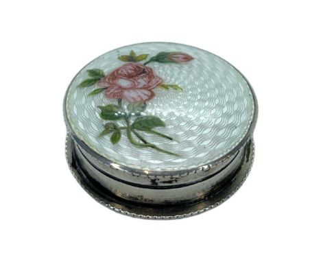 Guilloche enamel silver pill box. Roses and cream base enamel. M.Bros, Birmingham 19113.6 cms diameterCondition report: Excel