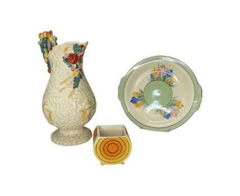 20th Century Clarice Cliff 'Celtic Harvest' jug, together with two further pieces of Clarice Cliff.28 cm highQty: 3