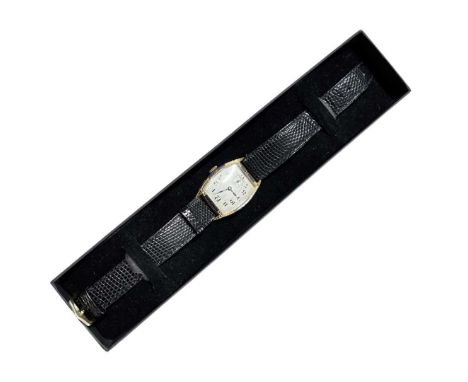 A mid 20th century tonneau shaped wristwatch, the case with engraved bezel and blue enamel detail, stamped to the back Eberha