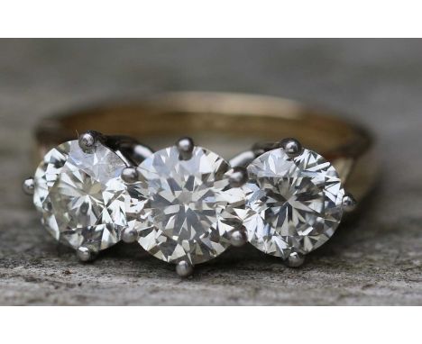 18ct Gold Platinum And Diamond Trilogy Ring18ct gold trilogy diamond ring with platinum setting total approx 3ct diamond Size