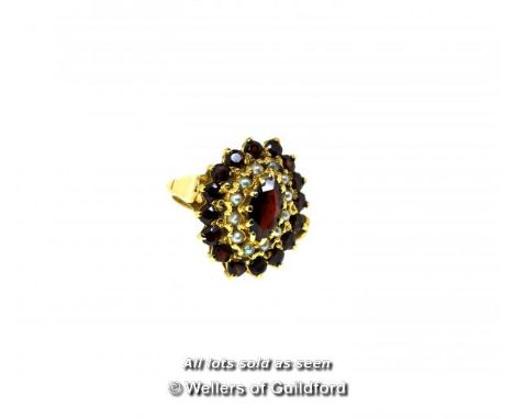 *Large seed pearl and garnet dress ring, central garnet with a surround of seed pearls and a further surround of garnets, mou