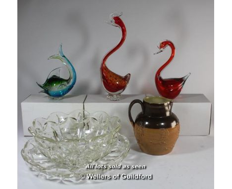 Royal Doulton stoneware hunting jug; three coloured glass bird or dolphin ornaments; large glass fruit bowl and stand (5).