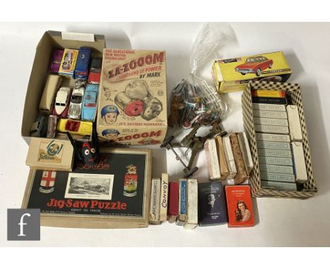 A collection of assorted toys, to include a boxed German Flottchen Derausreisser clockwork toy, a collection of Corgi diecast