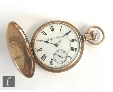 An American 10k full hunter crown wind pocket watch, engine turned case opening to a white enamelled dial with Roman numerals
