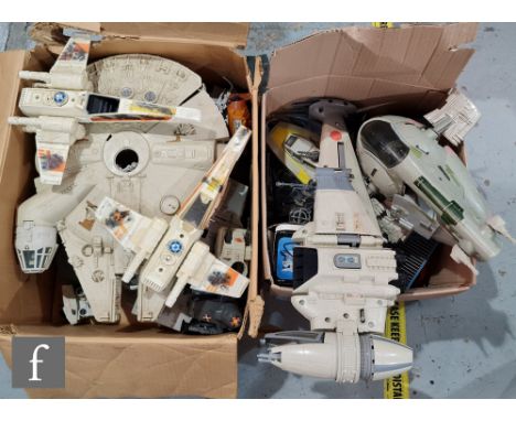 A collection of Kenner Star Wars vehicles, to include a boxed Vehicle Maintenance Energizer, Millennium Falcon, AT-AT, two X-