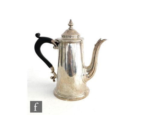 A hallmarked silver small coffee pot in the Queen Anne style terminating in ebonised scroll handle, weight 11oz, height 17cm,