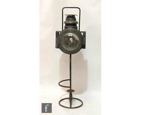 An Osmeka railway permanent way lamp, on stand, to take a gas canister. 