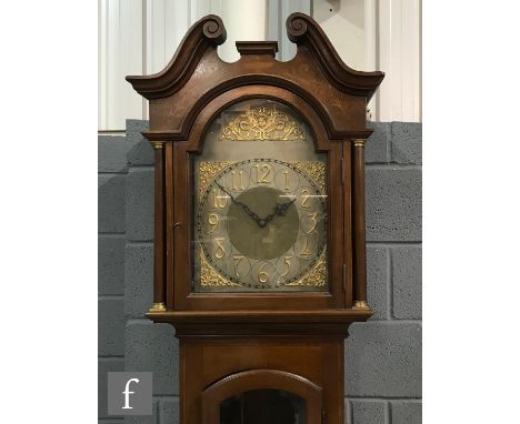 An Edwardian mahogany longcase clock, the Arabic arch dial with matted centre, spandrels and eight day triple train striking 