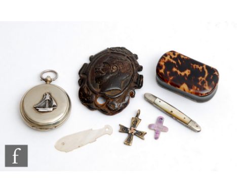 A 19th Century carved piece of coconut shell depicting the portrait of Edward VII, a tortoiseshell snuff box, a plated compas