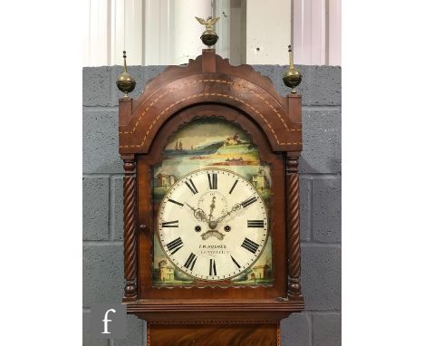 A 19th Century mahogany longcase clock with an eight-day movement striking on a bell, the hood with wrythen-turned pillars an