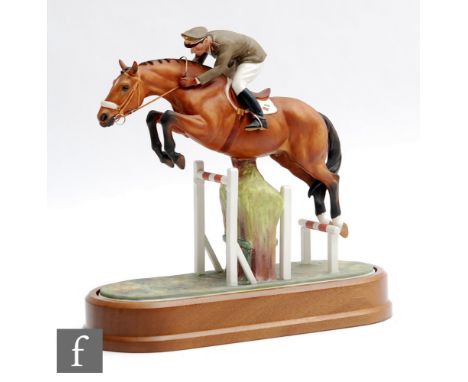 A boxed limited edition Royal Worcester Equestrian Statuette of Merano and Cap. Raimondo d'Inzeo, numbered 458 of 500, with c