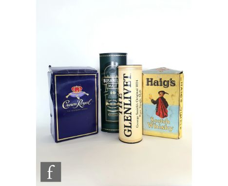 A collection of various whiskies, to include a Canadian Crown Royal blended, 1 litre, original box and sleeve, Bushmills ten 
