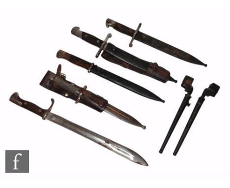 Two Spanish bayonets and scabbards both marked Toledo and stamped 3618 C and 4385 C, (both scabbards marked with different nu