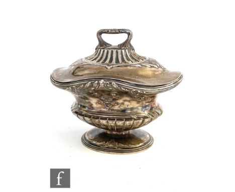 A 19th Century French silver pedestal boat shaped tea caddy with part fluted and floral swag decoration, weight 9oz, height 1