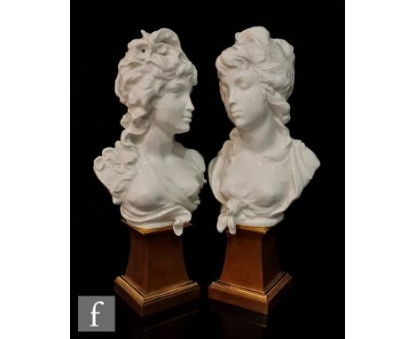A pair of later 20th Century Royal Worcester busts designed by Arnold Machin O.B.E R.A entitled Night and Day, the blanc de c