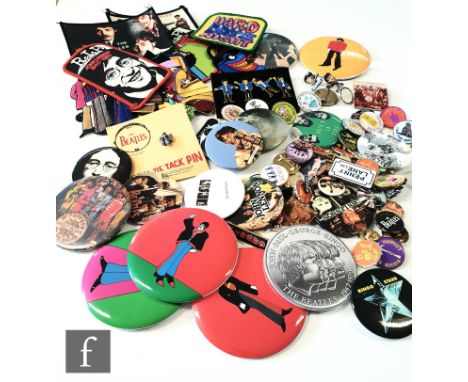 A collections of Beatles memorabilia to include various patches, tie pin, badges and various Beatles related pins etc. (qty) 