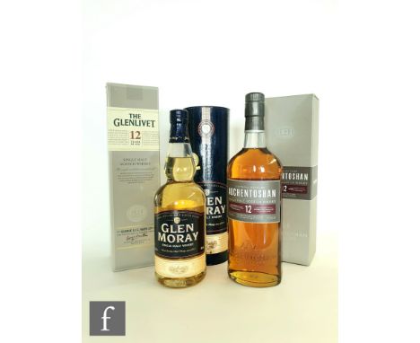Three bottles of single malt scotch whisky, to include triple distilled Auchentoshan 12 years aged, 70cl, in original box, Gl