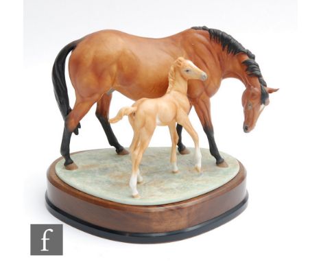 A boxed limited edition Royal Worcester equestrian study modelled by Doris Lindner of Princess Grace and Foal, numbered 427 o