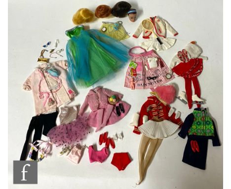 A collection of assorted 1960s Barbie fashions and accessories, comprising a Fashion Queen Barbie head with wig stand and thr