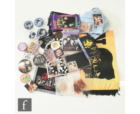 A collection of Beatles memorabilia to include The Beatles hair pomade, stamps, a John Lennon scarf, poker chips, key rings, 