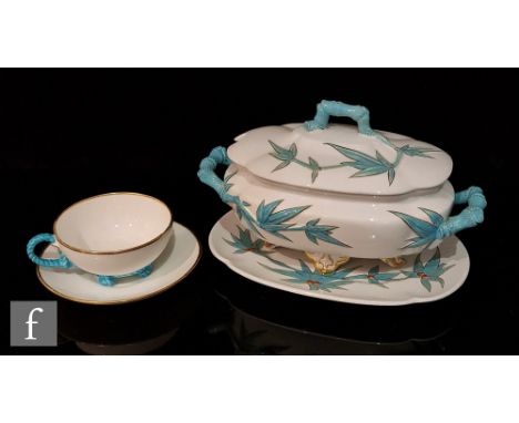 A 19th Century Royal Worcester tureen, cover and stand in the Aesthetic style decorated with blue enamel bamboo shoots with m
