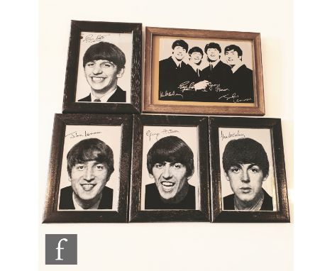 A group of four framed mirrors each printed with a portrait of John Lennon, Paul McCartney, George Harrison and Ringo Starr a