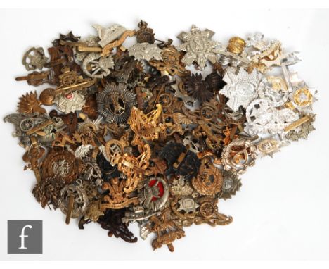 A large collection of army cap badges, various regiments to include Scottish regiments, Grenadiers, &nbsp;and others includin