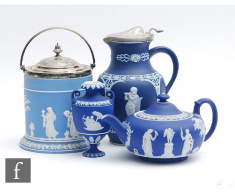 Four pieces of late 19th to early 20th Century Wedgwood jasperware comprising a biscuit barrel, a squat teapot, a small vase,