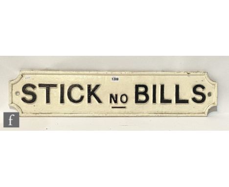 A white painted cast iron railway office sign, 'Stick no Bills', 17.5cm x 81cm.