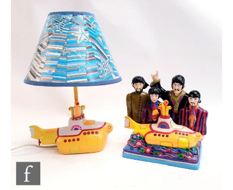 Two Beatles collectables, to include a Gartlan USA limited edition large Yellow Submarine figure, numbered 914/1968, in origi