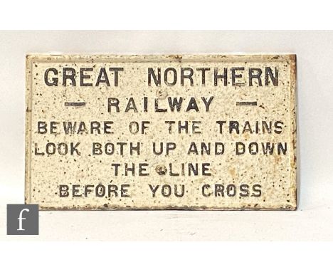 A cast iron sign for Great Northern Railway 'Beware of the Trains', 31.5cm x 56cm, a forty shillings penalty 'failure to shut