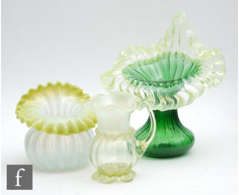 A late 19th Century posy vase of fluted ovoid form with a banded opalescence over a graduated lime green with a frill and fol