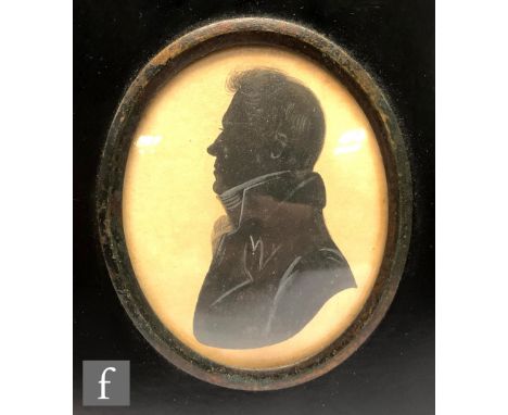 An early 19th Century painted silhouette depicting Mr James Gibson in profile, oval, framed, 8cm x 5.5cm, frame size 13cm x 1