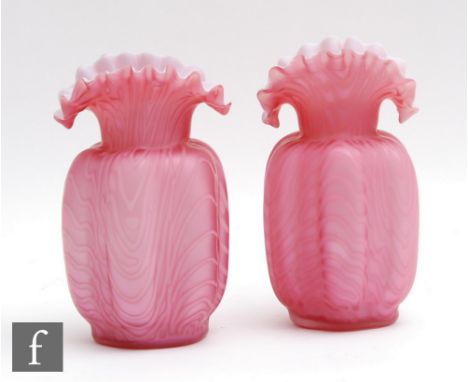 A pair of late 19th Century satin air trap vases of lobed form with a collar neck and folded frill rim, cased in pink over op