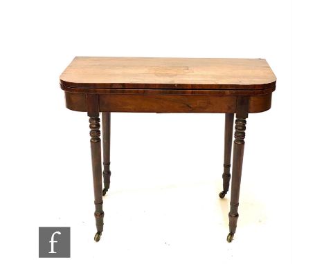 A George IV rosewood D shaped fold over card table, on ring turned legs, 76cm x 91cm. 