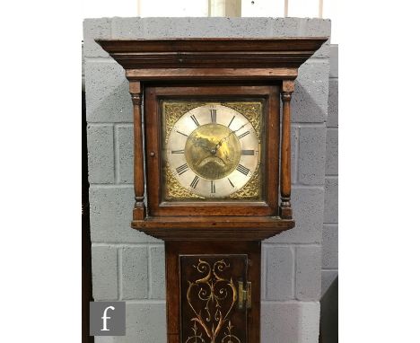 A late 18th Century oak longcase clock with an associated 30-hour movement striking on a bell, the painted trunk and base sec