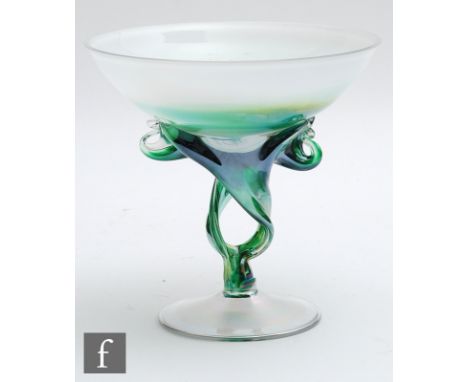 A 20th Century studio glass tazza, the opal bowl above a wrythen green iridescent stem, raised to a conical foot, unmarked, h