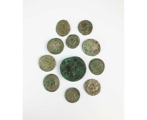 A small collection of Roman coins, comprising; a Sestertius of Antoninus Pius as Caesar, early 138AD and silver and silver co