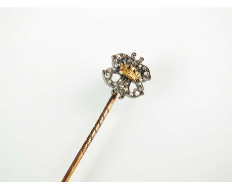 A 19th century diamond set stick pin, designed as two entwined rose cut diamond set 'B' letters mounted with yellow metal ena